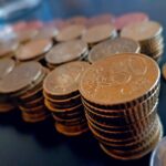 Moneta da 50 centesimi rara, valutata 10.000 euro, con dettagli evidenti per collezionisti.